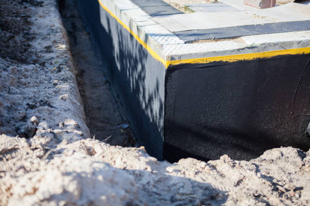 Professional Wet Basement Repair technician working in Riverside, MD
